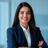 Portrait of Aisha Khan, Operations Director at Lumen Rhythms